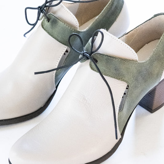 MINK AND GREEN HEELS