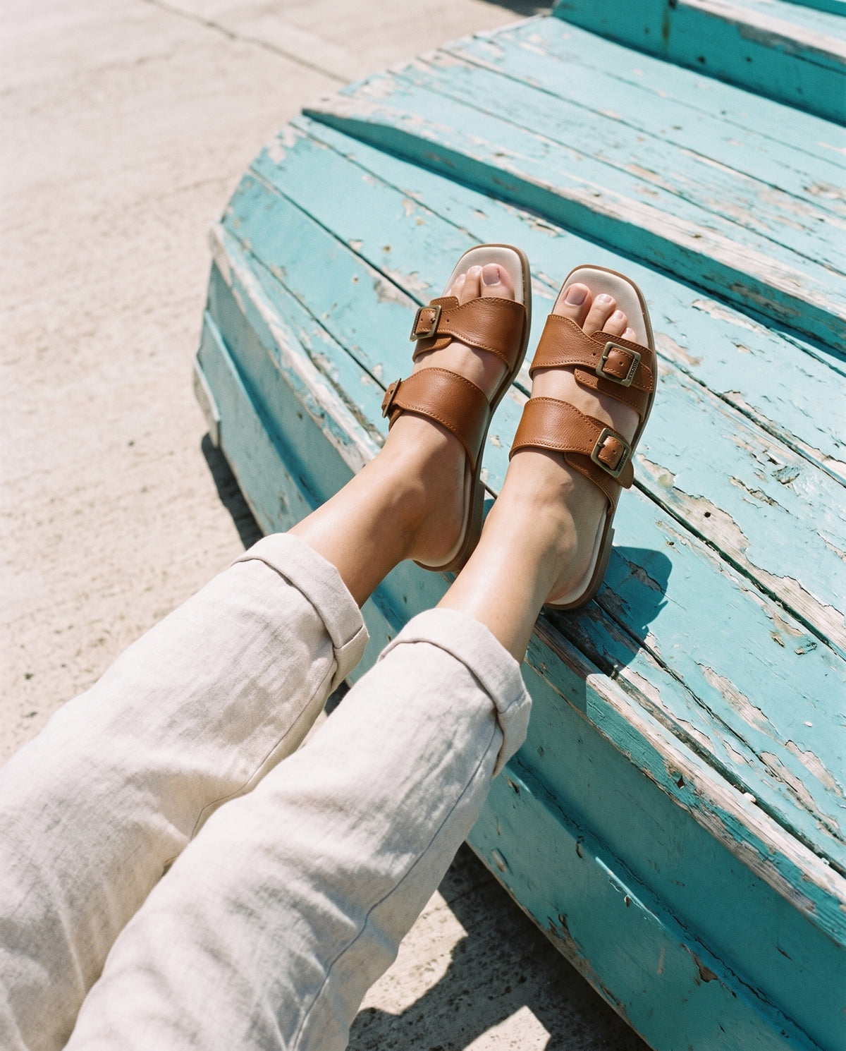 Phelan Buckle Sandal in tan leather, worn
