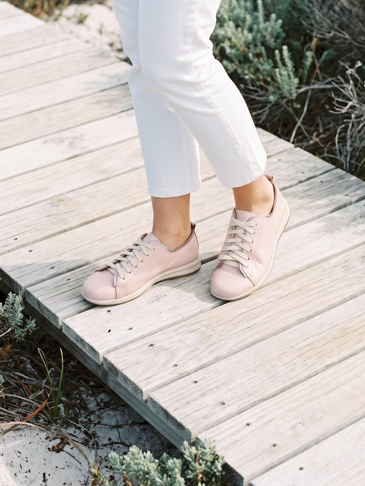 Phelan Hydra Sneaker in blush and silver leather, worn