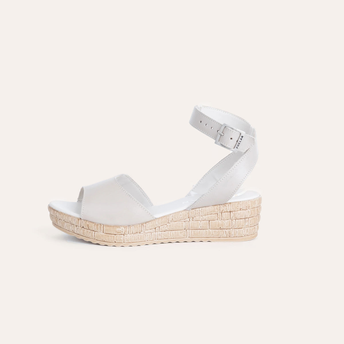Vela Wedge, handmade leather wedge sandal by Phelan Footwear