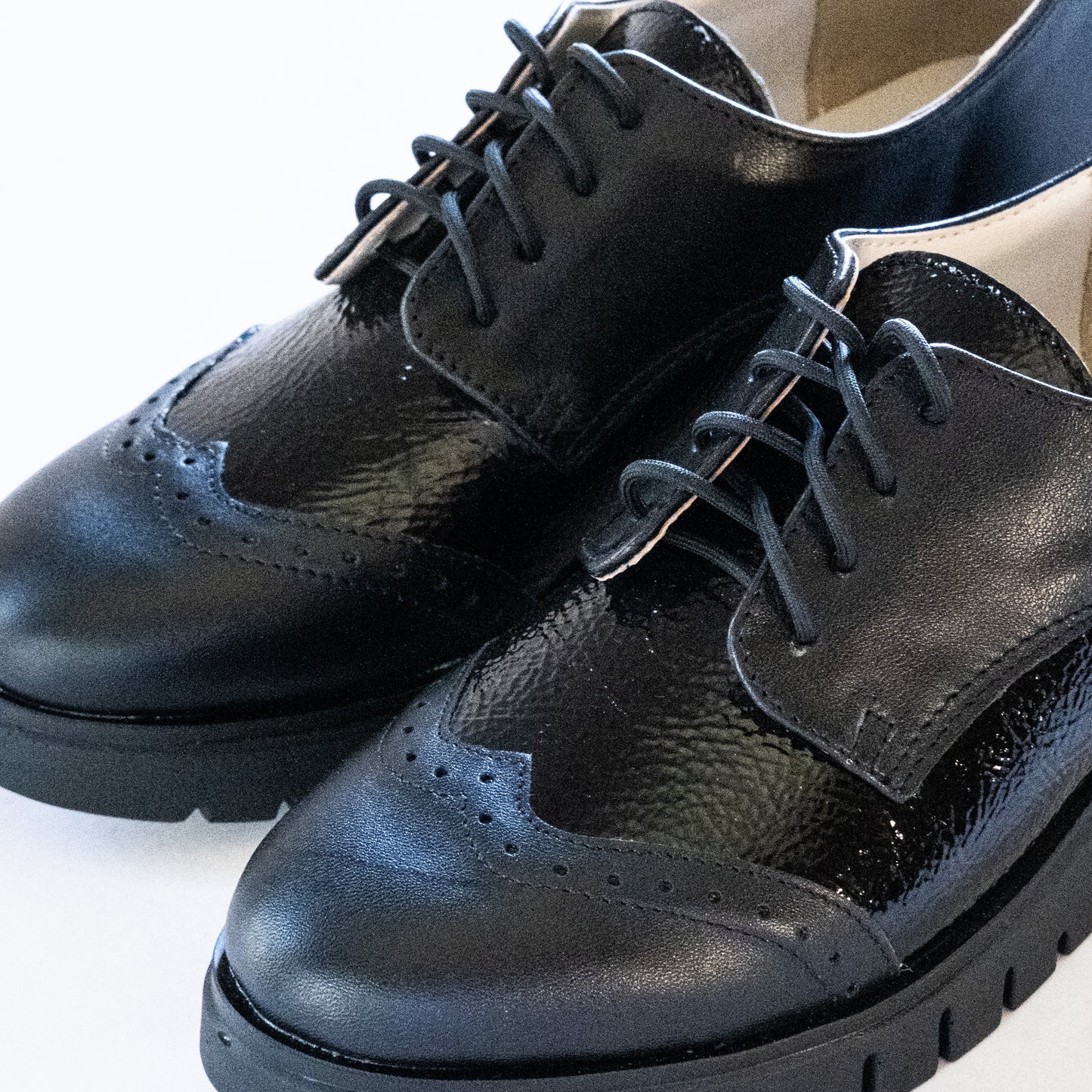 BLACK LIFTED LOAFERS