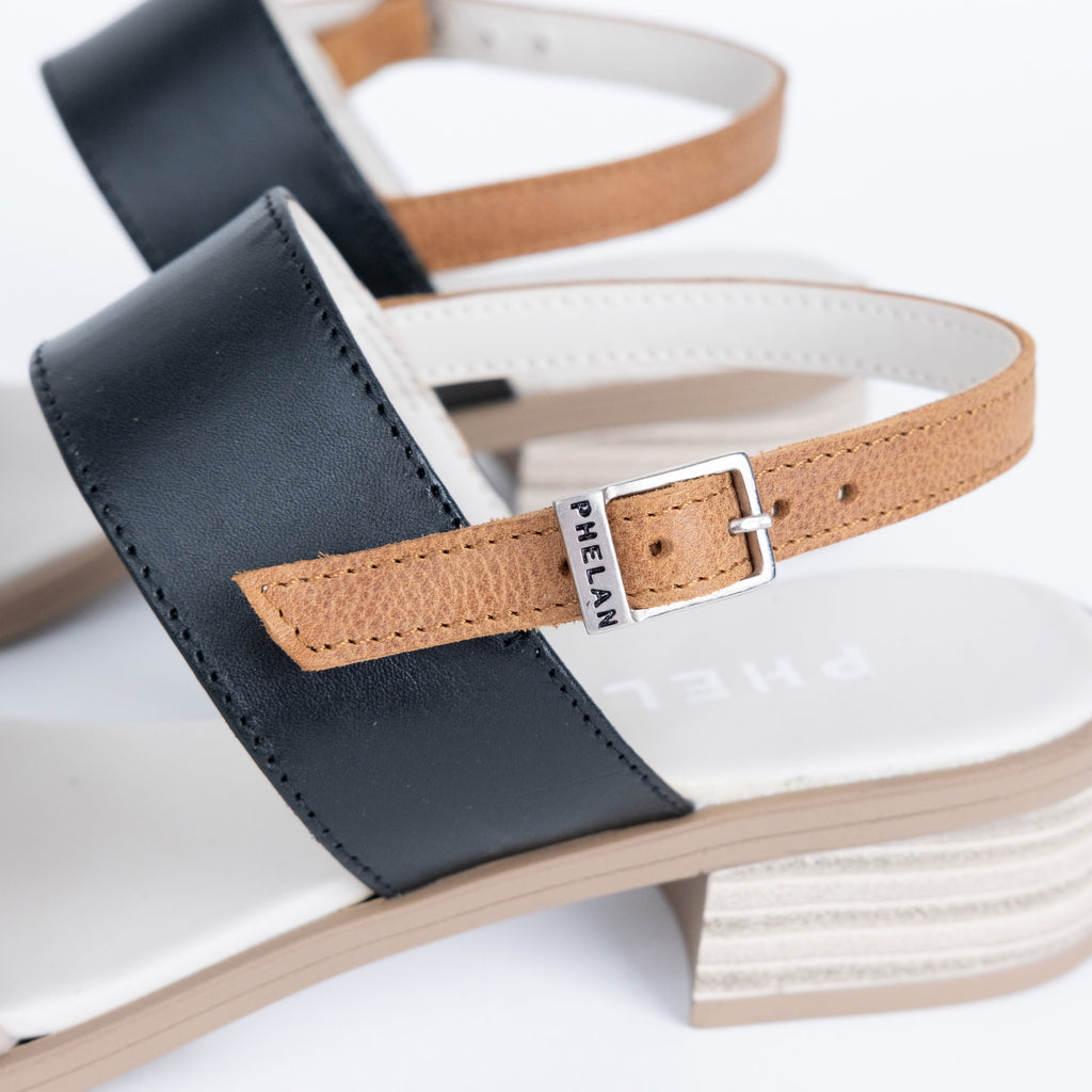 Portofino Heel in Taupe/Black/Tan, close-up of the buckled heel strap