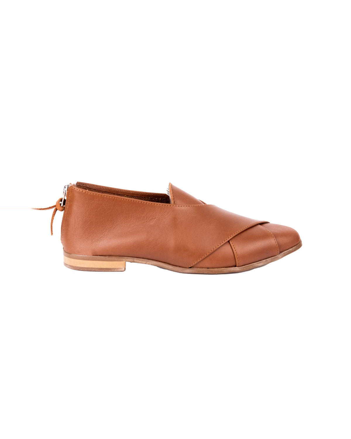 Crossover Pixie – tan leather flat with a crossover strap and back zip, side view, handmade by Phelan