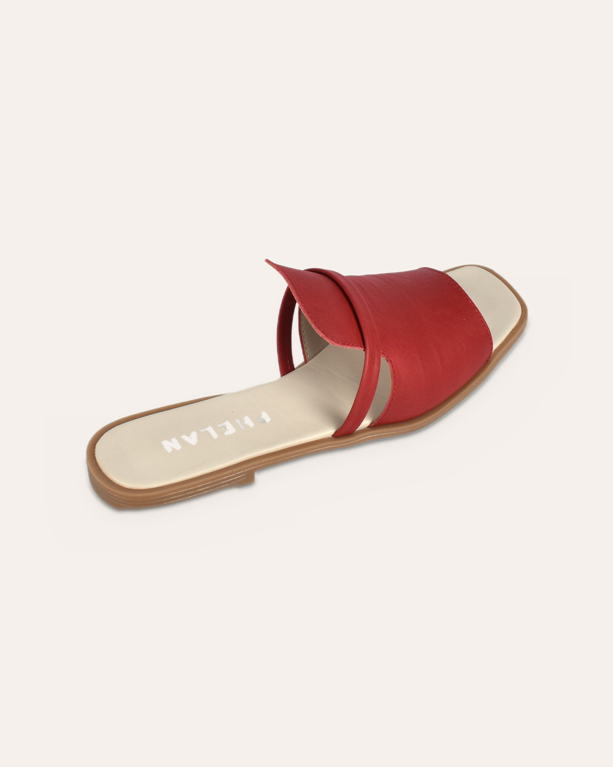 Ravello Slide in Red, one shoe from the heel end