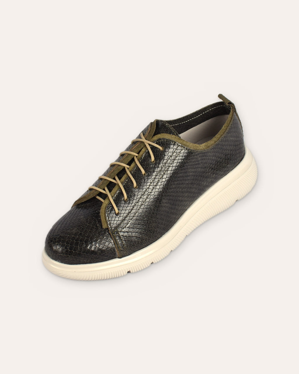 Deck Sneaker in Olive/Olive, one shoe from the toe