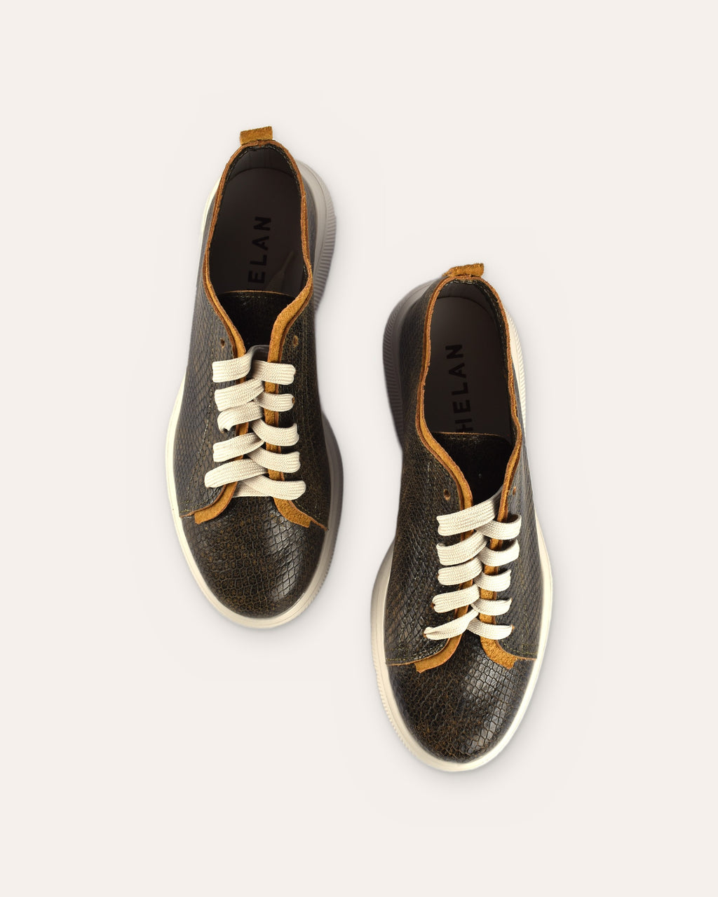 Deck Sneaker in Olive/Mustard from above, showing the PHELAN footbed
