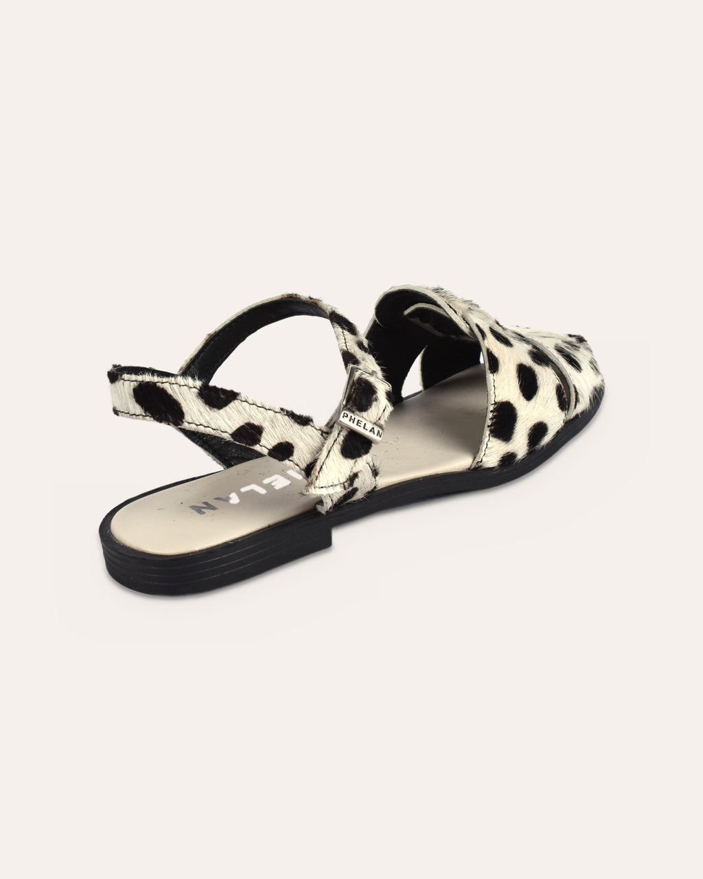 Bosun Sandal in Dalmatian, one shoe from the heel end