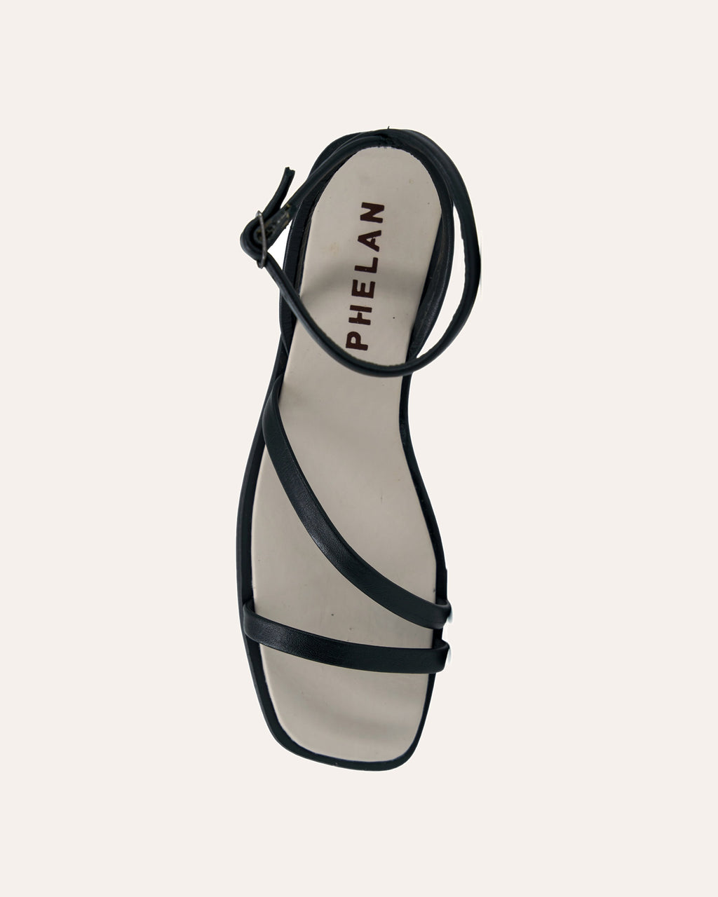 Mila Sandal in Black, one shoe from above