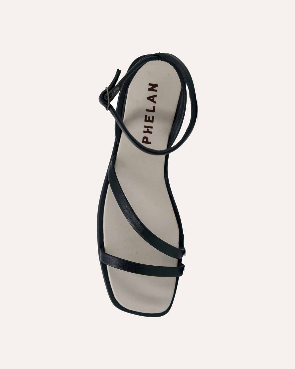 Mila Sandal in Black, one shoe from above