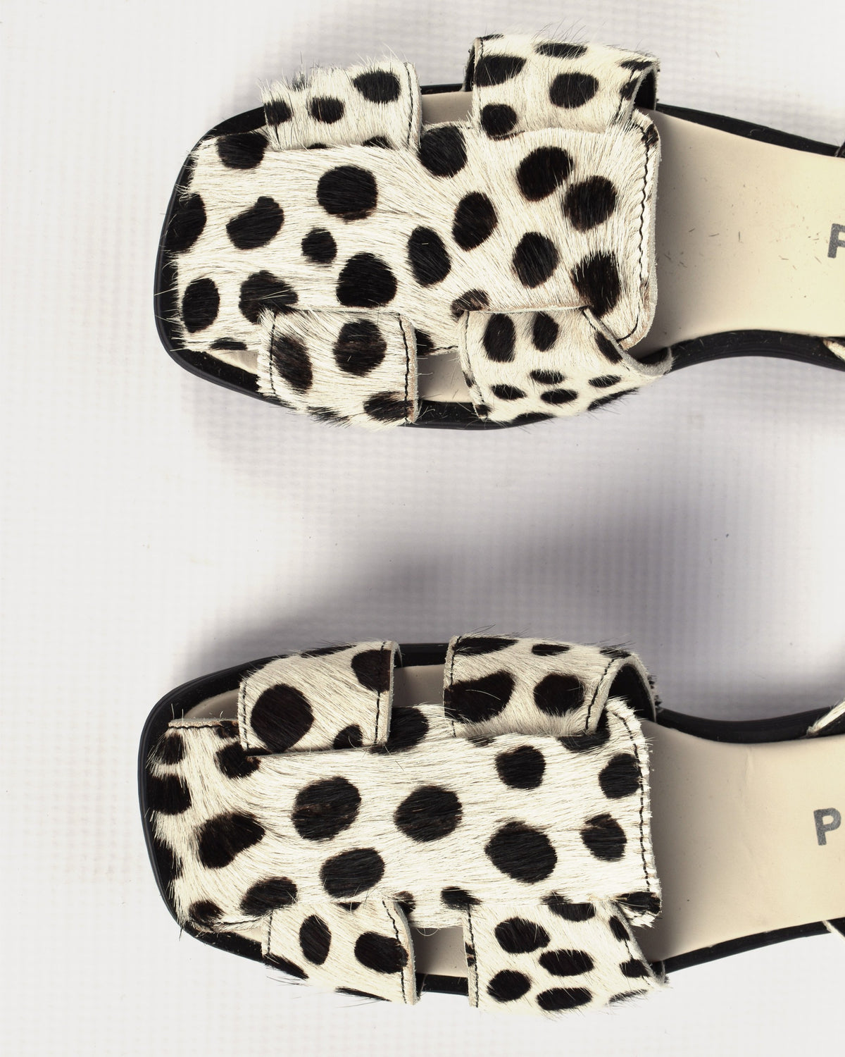 Bosun Sandal in Dalmatian, the toes of the pair from above, showing the hair-on leather