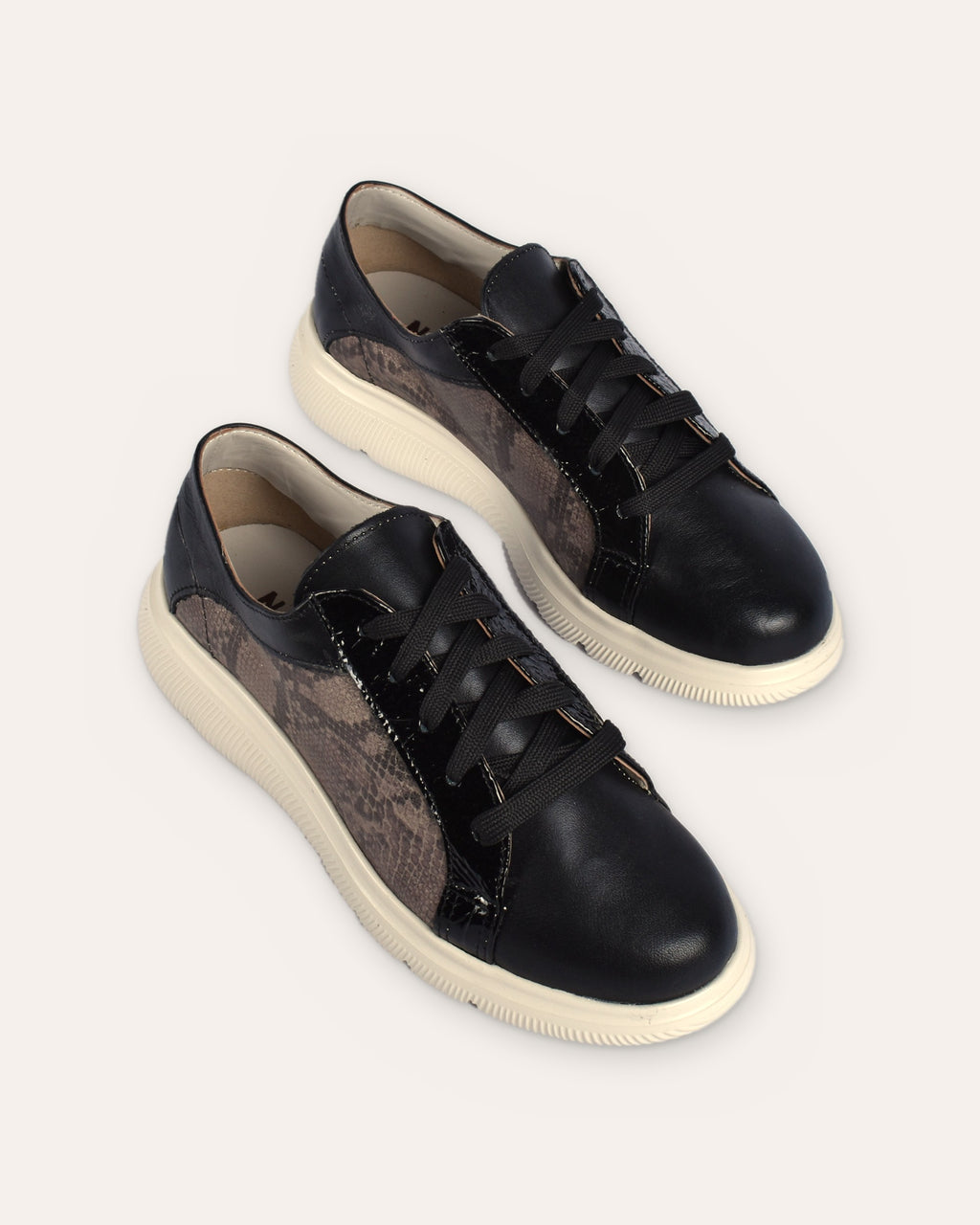 Harbour Sneaker in Black/Snake, the pair from the toe end