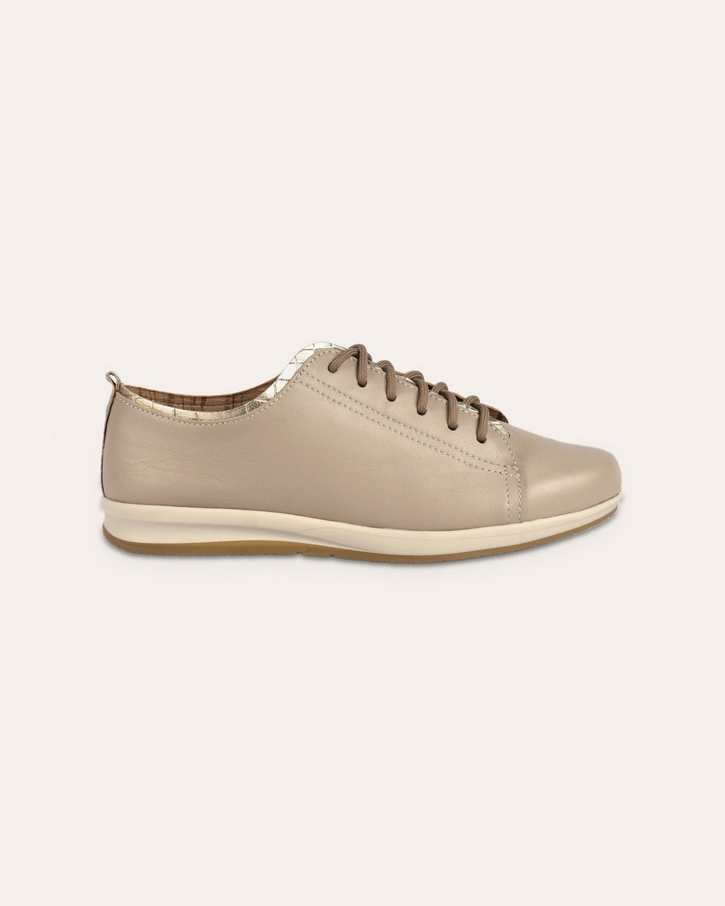 Hydra Sneaker in Taupe/Gold, side view of the slim cream sole