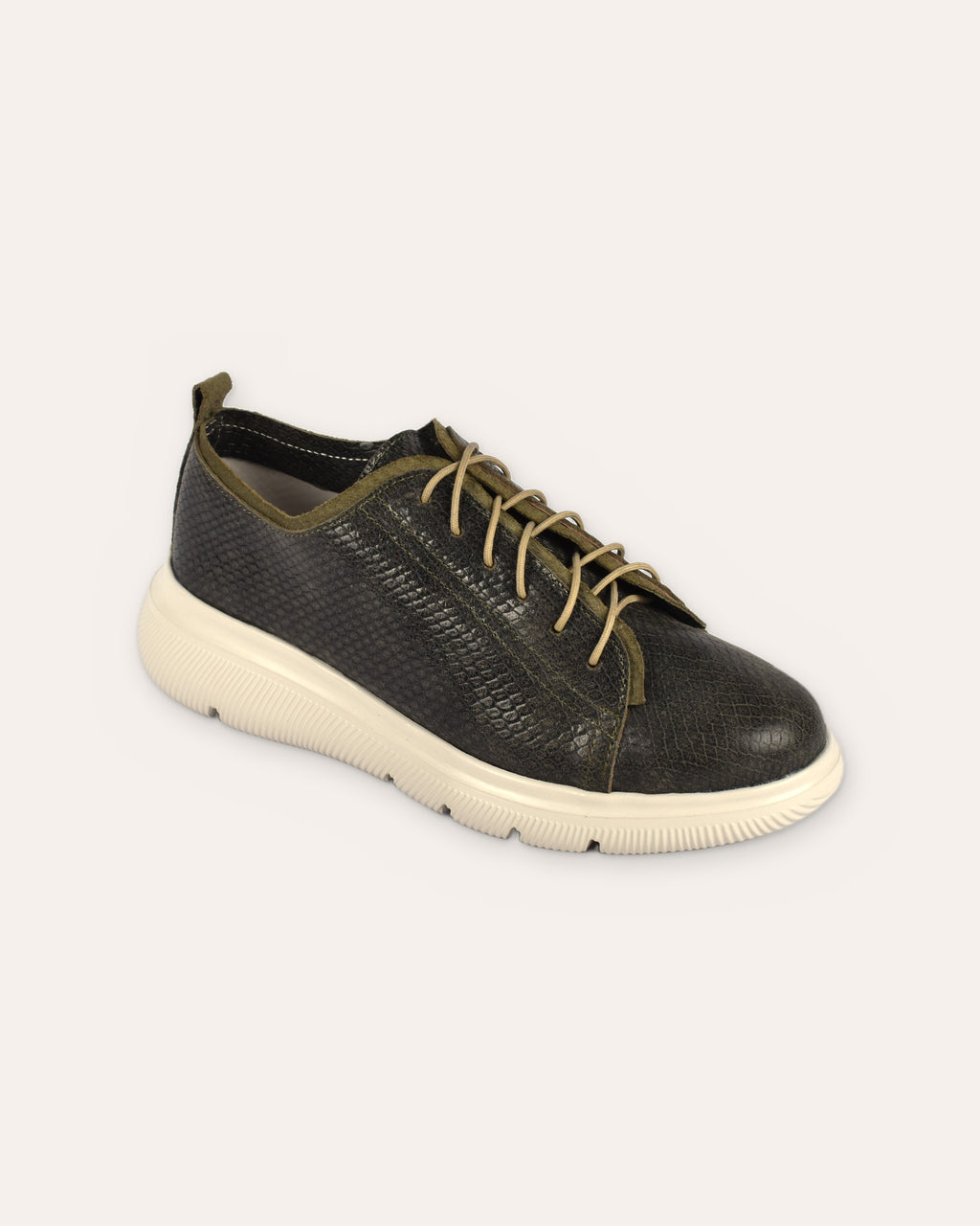 Deck Sneaker in Olive/Olive, one shoe from the front three-quarter