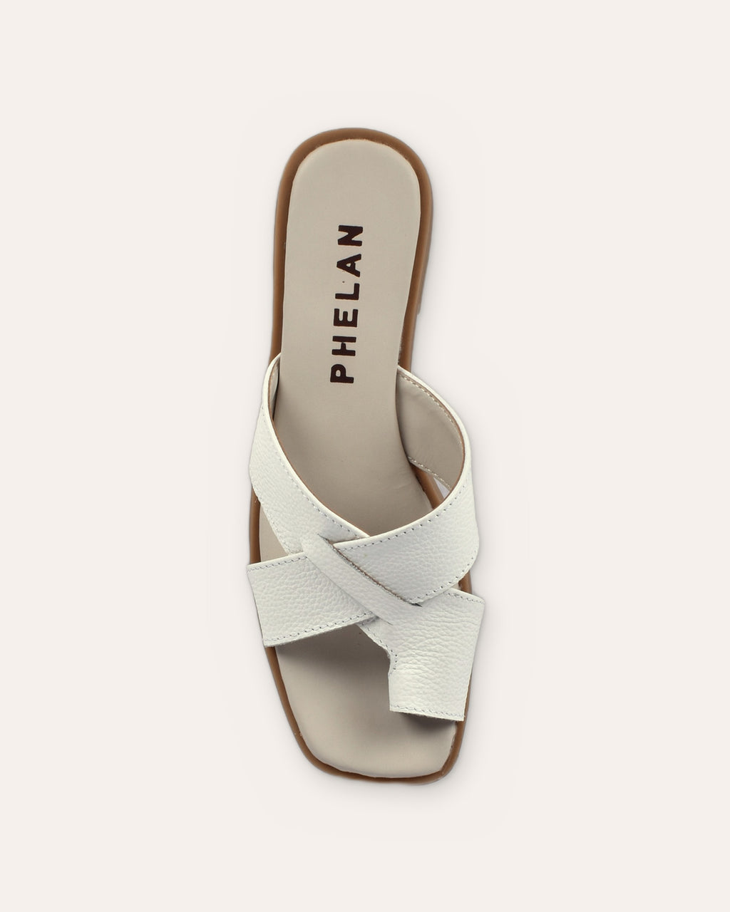 Isla Slide in White, one shoe from above