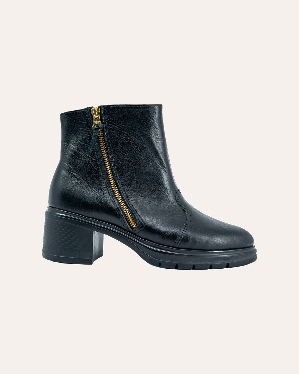 Elena Ankle Boot in Black, side view showing the gold zip and block heel