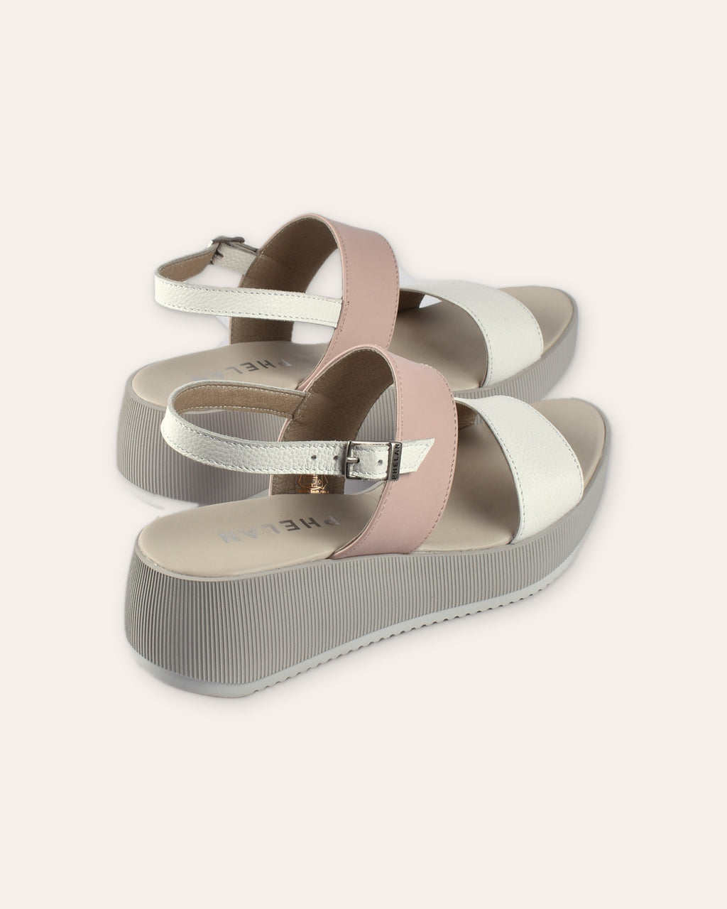 Portofino Platform in White/Blush from the heel, showing the buckled slingback