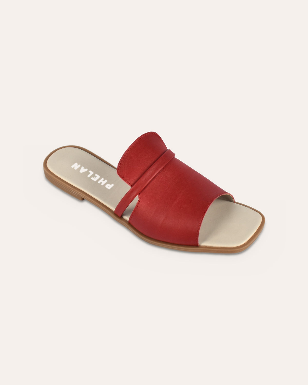 Ravello Slide in Red, one shoe close
