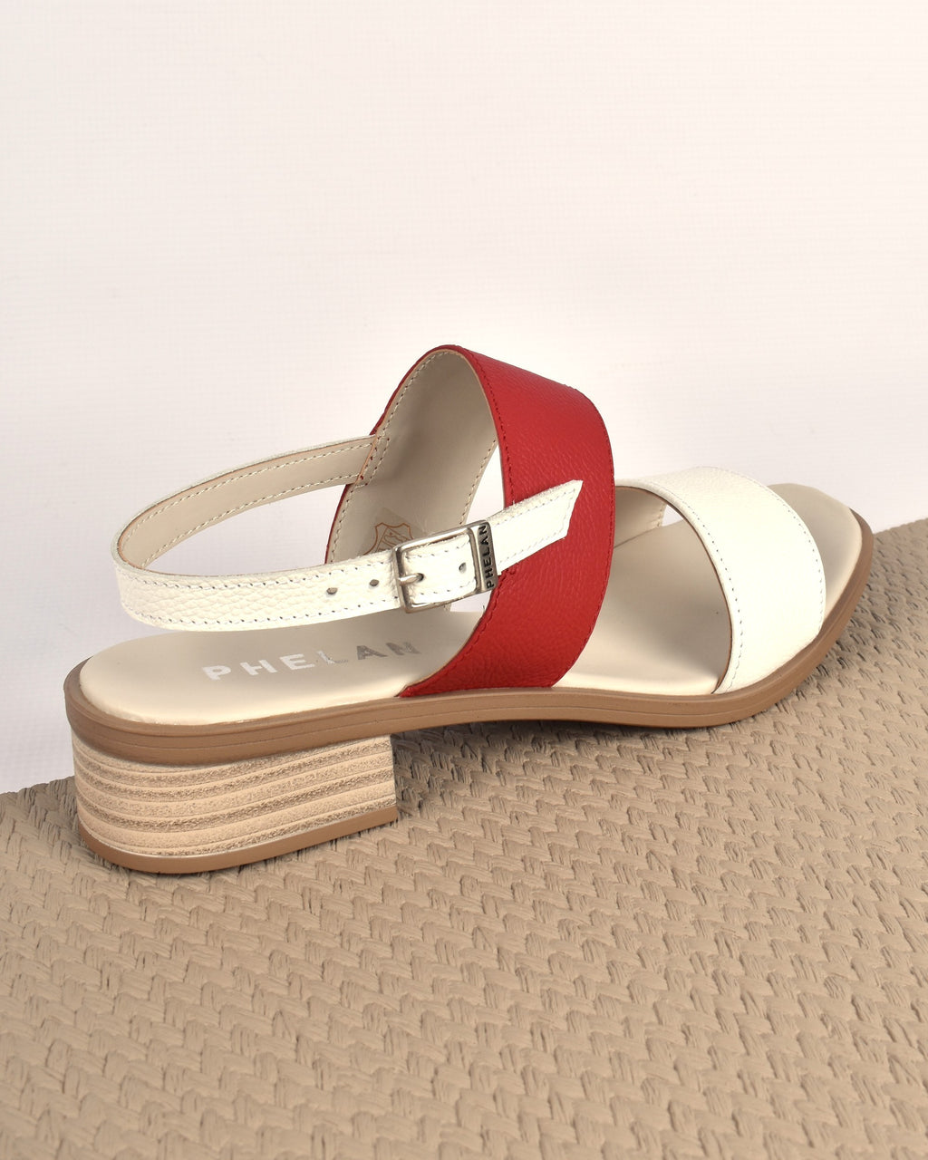 Portofino Heel in White/Red from the heel side, showing the 4cm stacked heel