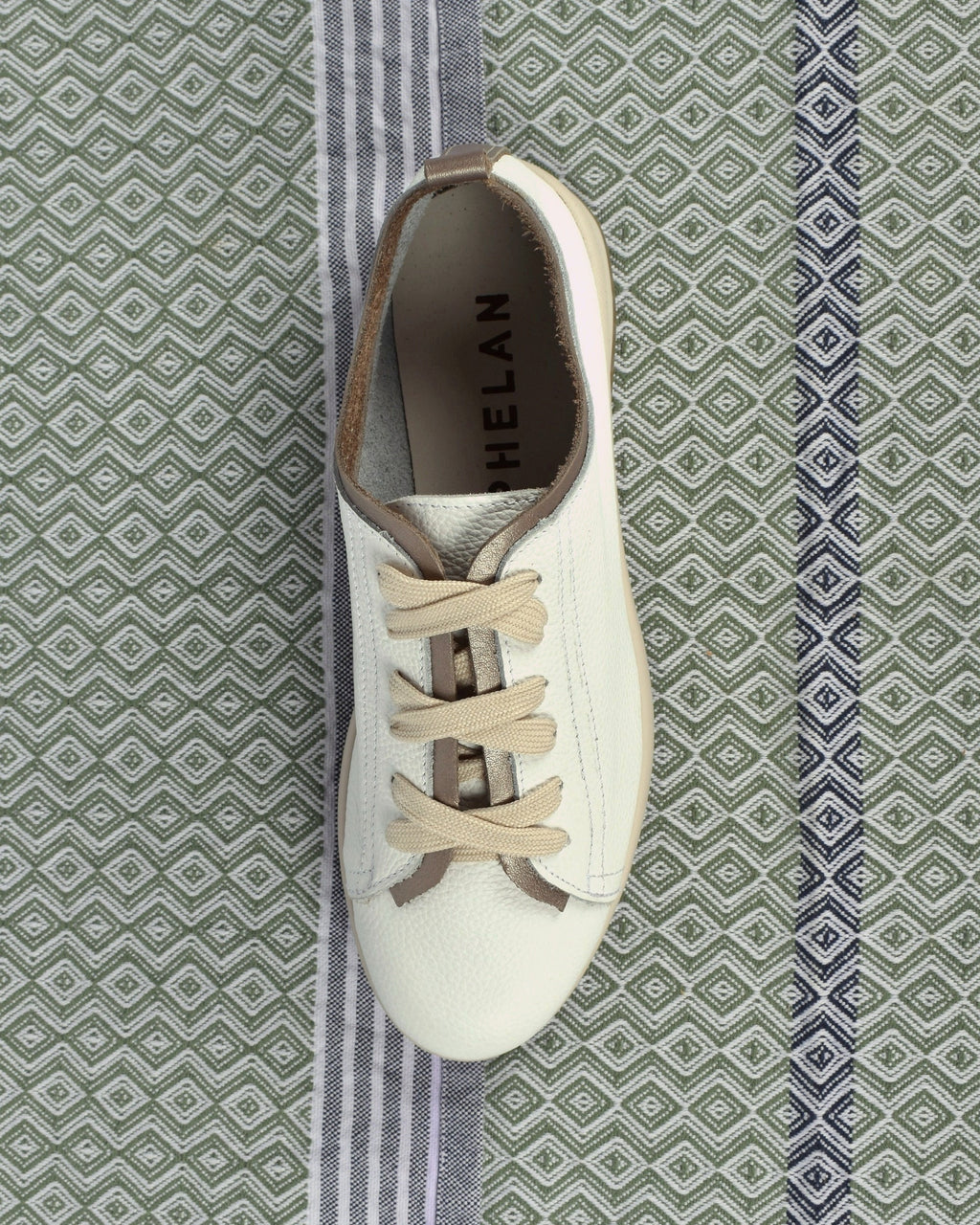 Hydra Sneaker in White/Pewter from above, showing the PHELAN footbed