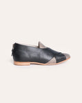 Crossover Pixie – black leather flat with metallic print toe and crossover strap, side view, handmade by Phelan